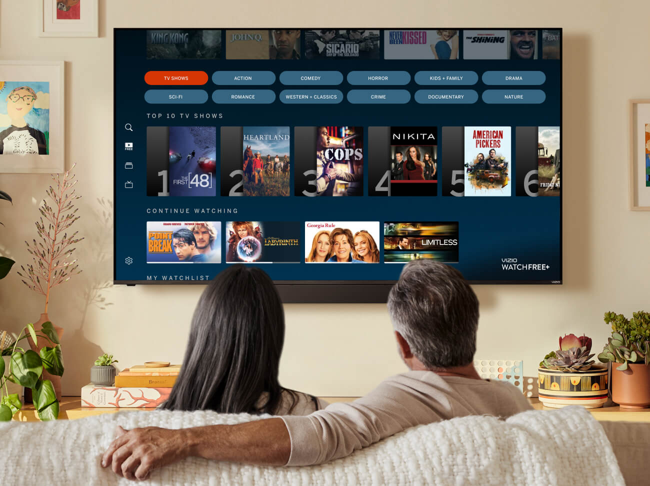 couple watching tv in livingroom