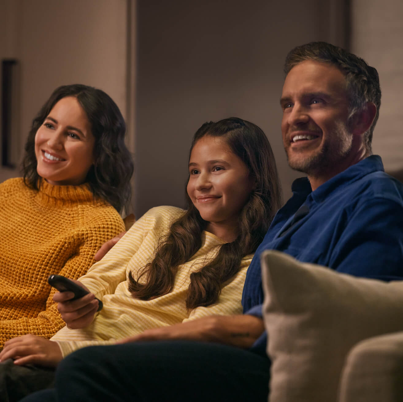 happy family watching tv
